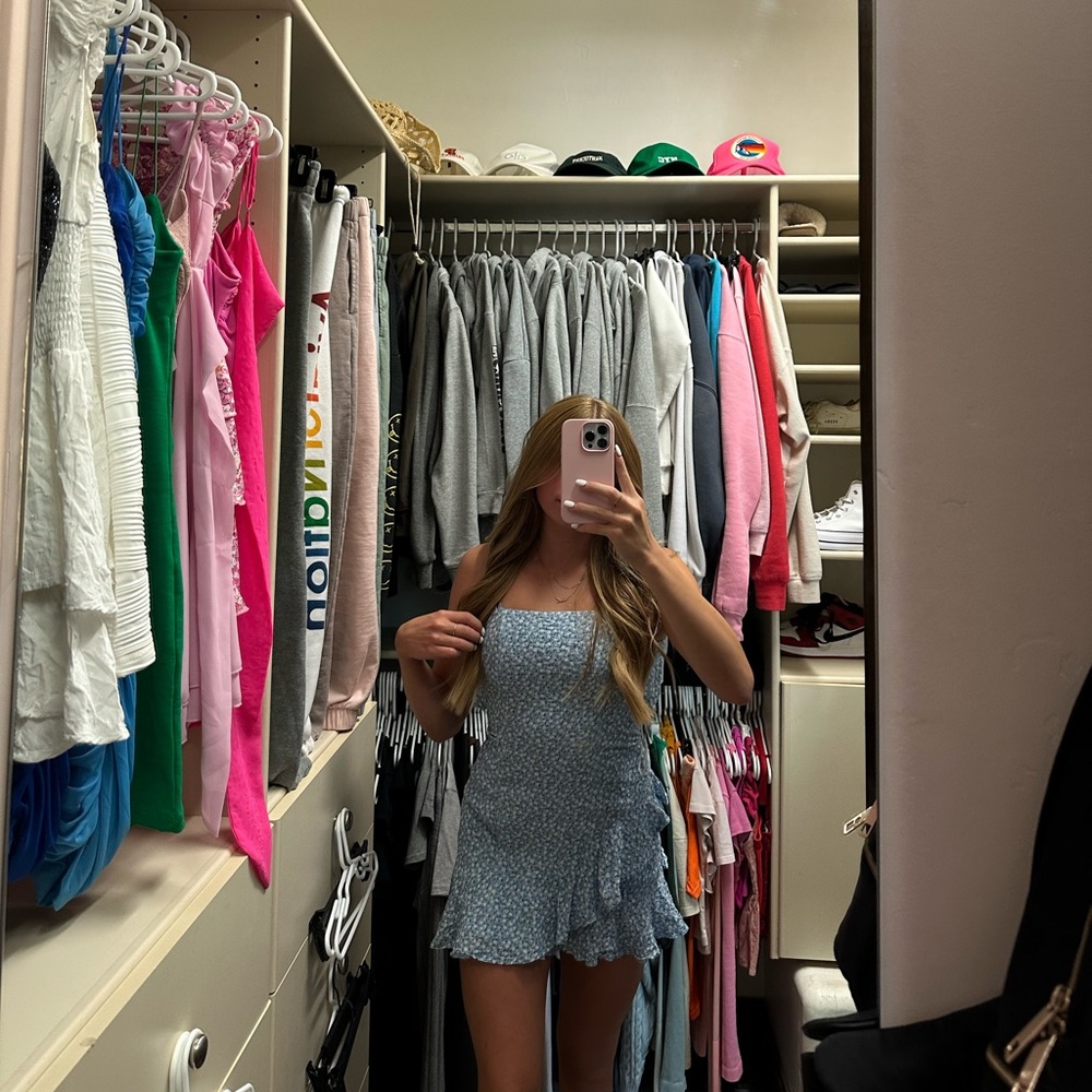 This is a blue floral print princess Polly dress in a size 2